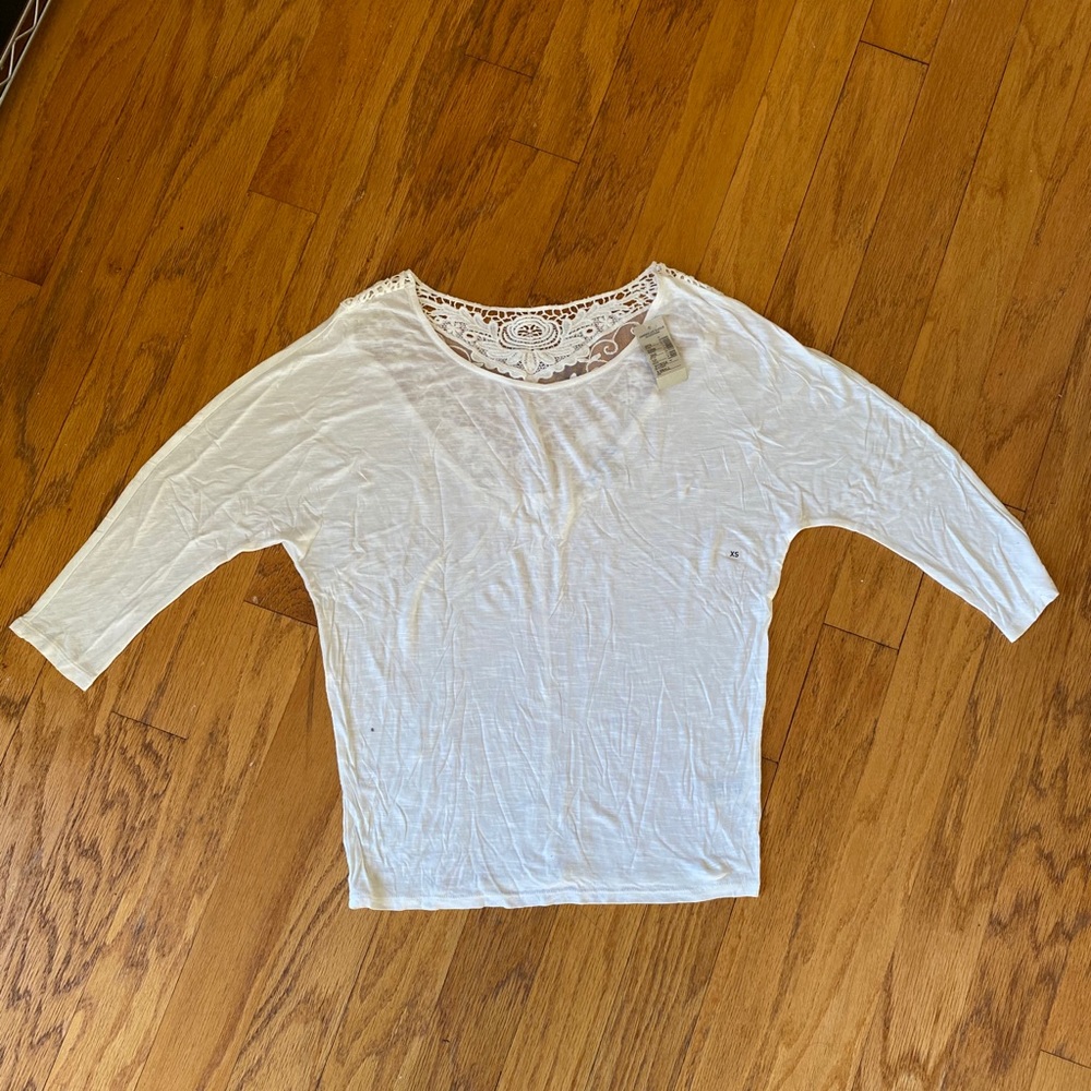 American Eagle Outfitters cream colored shirt